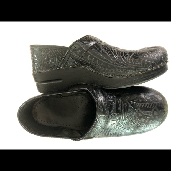 dansko black tooled leather clogs